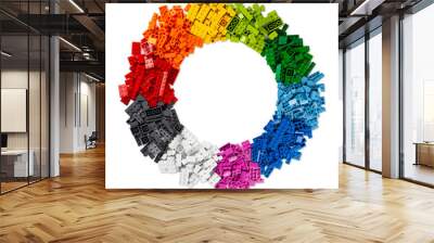 top view of pile of many various colorful rainbow colored stackable plastic toy bricks in circle shape with copy space isolated white background Wall mural