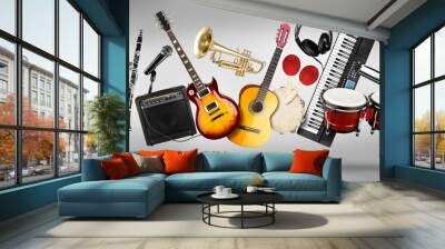 wide panorama collage  of various musical instruments. Guitar keyboard Brass percussion studio music concept grey background Wall mural