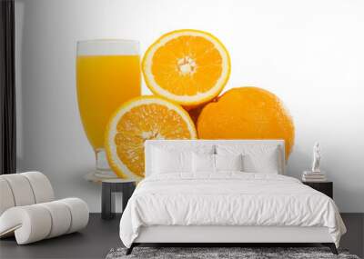 Glass of fresh orange juice with sliced oranges on white backgro Wall mural