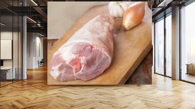 Raw pork leg on a cutting board Wall mural