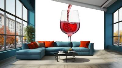 A bottle of red wine pouring into a crystal glass, capturing the rich color and elegant nature of wine. Wall mural