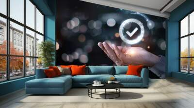 A hand holding digital icon of the checkmark Wall mural