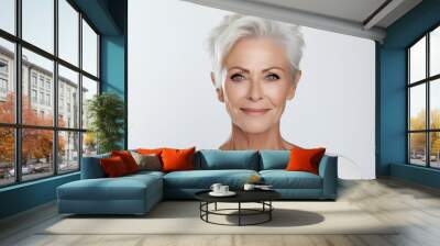 Beautiful gorgeous 50s mid aged mature woman looking at camera isolated on white. Mature old lady close up portrait. Healthy face skin care beauty, middle age skincare cosmetics, cosmetology concept  Wall mural