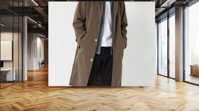 Stylish Male Fashion Model in Modern Menswear and Formal Attire – Trendy Fall/Winter Outfits Featuring Jacket, Suit, and Casual Look Wall mural