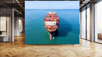 Large container ship at sea - Low angle aerial image. Wall mural