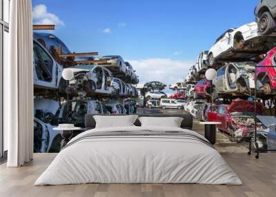 Large Salvage Car parts and Vehicles lot, with rows of stacked totalled Cars Wall mural