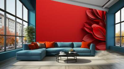 An artistic image featuring vibrant red tropical leaves against a matching red background, creating a bold visual impact. Wall mural