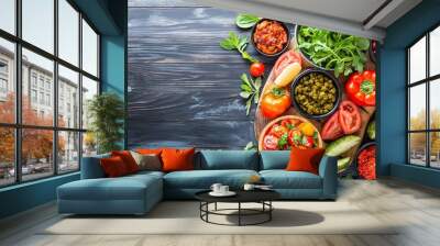 An overhead shot showcasing a variety of fresh vegetables and herbs in vibrant hues, ideal for culinary and healthy living. Wall mural