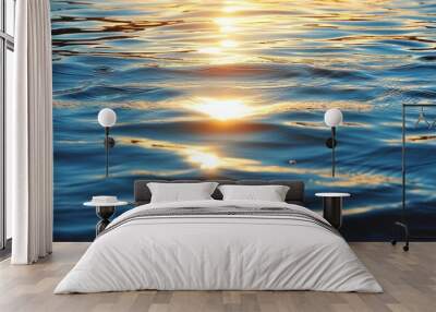 Sunlight gently reflects and glimmers off the surface of water, creating shimmering ripples on a peaceful day. Wall mural