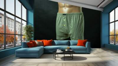 Men's underpants on a mannequin. On an isolated background. Wall mural