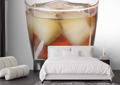 Whiskey with ice cubes. Isolated on white Wall mural