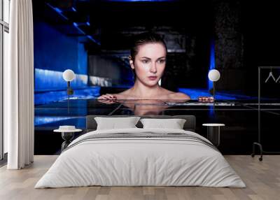 Beautiful woman in a jacuzzi bathtub Wall mural