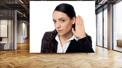 Business woman with hand to ear Wall mural