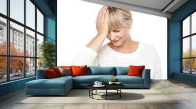 Sad middle aged woman suffering from headache Wall mural