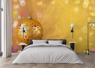 Shiny banner with golden Christmas ball and yellow background Wall mural