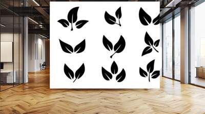 Set of black leaf icons. Leaves of trees and plants. Leaves on white background. Ecology. Vector illustration. Wall mural