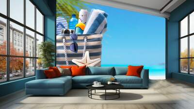 Beach bag with accessories and tropical beach Wall mural