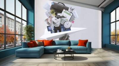 Businessman and office supplies on a paper plane Wall mural