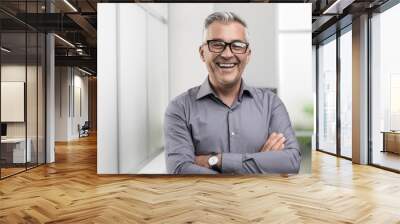 Confident businessman posing in the office Wall mural