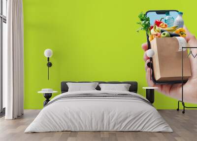 Online grocery shopping app on smartphone Wall mural