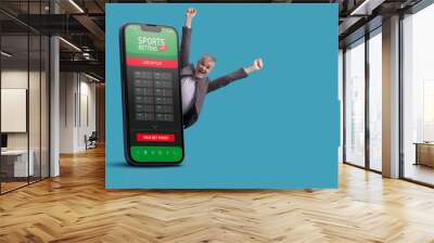 Online sport betting game on smartphone Wall mural