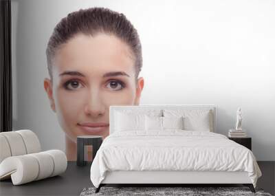 Smiling woman posing on white background Wall mural