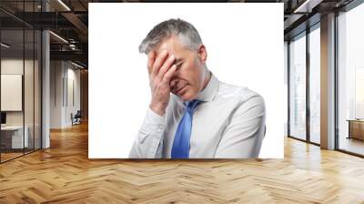 Stressed corporate businessman touching his head Wall mural