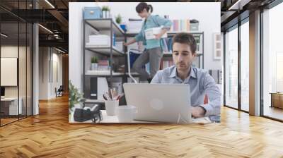 Two people working in the office Wall mural