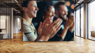 Group of people clapping hands and smiling, at an event or gathering, showing appreciation, joy, and human connection. Wall mural