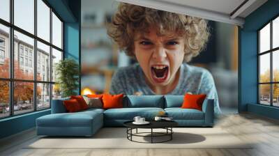 Little boy playing video games on smartphone and getting angry Wall mural