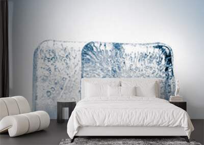 Clear ice blocks, isolated on white background, with copy space. Wall mural