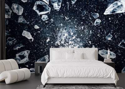 Ice, crushed on black background. Shards of crushed ice spreading away. The explosion of ice. Wall mural