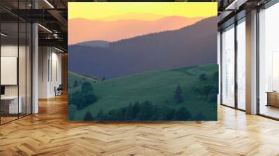 Wide panorama of mountains in sunset light rays. Carpathian mountains. Ukraine. Wall mural