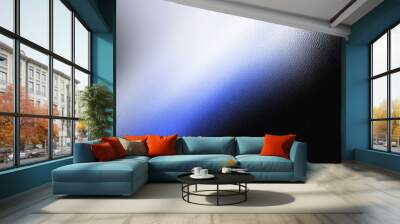 Blurry image of a blue and white line with a black background Wall mural