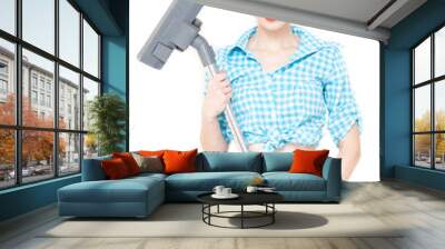 Beautiful young house wife with vacuum cleaner on white Wall mural