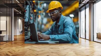 Manufacturing Factory black male Mechanical Engineer Works on Personal Computer at Metal lathe industrial manufacturing factory. Engineer Operating lathe Machinery. African people. Wall mural