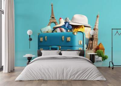 Creative summer beach composition in suitcase on blue background. travel concept idea. Wall mural