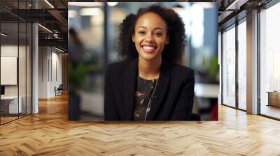 female african business woman smiling and working with client. Business meeting concept Wall mural