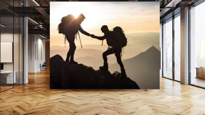 teamwork Help and assistance concept. Silhouettes of people climbing on mountain and helping Wall mural