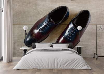 Classic design mens shoes in polished leather top view Wall mural