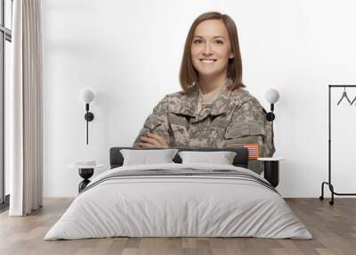 Female Army Soldier With Arms Crossed Wall mural