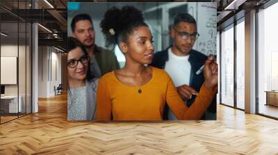 multi-ethnic group of business people planning startup project on glass board in office Wall mural