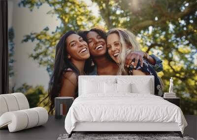 portrait of a happy multiethnic group of smiling female friends - women laughing and having fun in t Wall mural