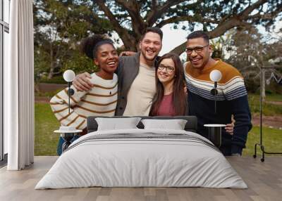 Portrait of a smiling diverse group of young friend enjoying in the park - colorful clothing - very happy  Wall mural