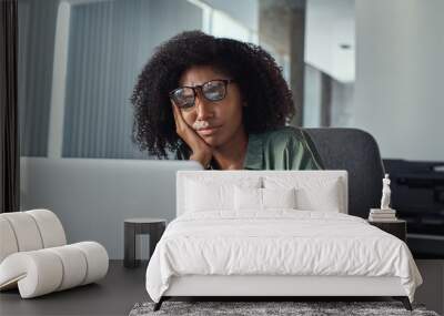 stressed frustrated young businesswoman looking at laptop Wall mural