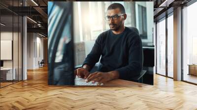 Young businessman working at workplace Wall mural