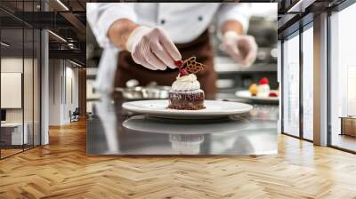 Pastry chef is completing a dessert in a hotel or restaurant kitchen.  Wall mural