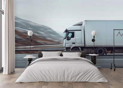 Side view of a moving truck on the road. White copy space on the truck Wall mural