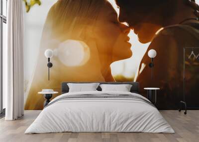 Close up portrait of a beautiful young couple waiting to kiss in their traveling time against sunset light. Wall mural