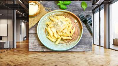  Home made  italian penne rigate pasta  with parmesan cheese,garlic  and black pepper .Pasta cacio e pepe. Mediterranean food concept Wall mural